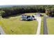 Aerial view showcasing the home's country setting at 997 Jackson Rd, Fuquay Varina, NC 27526