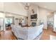 Spacious living room with a large sectional sofa and fireplace at 997 Jackson Rd, Fuquay Varina, NC 27526