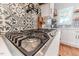 Stainless steel gas cooktop with black accents, in a modern kitchen at 997 Jackson Rd, Fuquay Varina, NC 27526