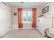 Bright bedroom featuring a large window and neutral decor at 997 Jackson Rd, Fuquay Varina, NC 27526