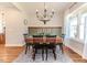 Rustic-chic dining room with wood table and green accent wall at 997 Jackson Rd, Fuquay Varina, NC 27526