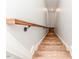 Modern staircase with dark wood and metal railing at 997 Jackson Rd, Fuquay Varina, NC 27526