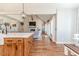 Open concept kitchen with island and hardwood floors at 997 Jackson Rd, Fuquay Varina, NC 27526
