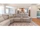 Open living room showcasing a spacious sectional sofa and hardwood floors at 997 Jackson Rd, Fuquay Varina, NC 27526