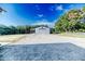 Detached garage with covered awning and ample parking at 997 Jackson Rd, Fuquay Varina, NC 27526