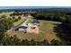 Aerial view of a home with detached garage and large yard at 997 Jackson Rd, Fuquay Varina, NC 27526
