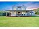 Two story farmhouse with large front porch and expansive lawn at 997 Jackson Rd, Fuquay Varina, NC 27526