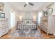 Spacious bedroom with wood floors and a king-size bed at 997 Jackson Rd, Fuquay Varina, NC 27526