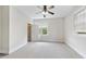 Well-lit bedroom with ceiling fan, closet, and window at 1421 Yarborough Park Dr, Raleigh, NC 27604