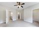 Spacious bedroom with ceiling fan and access to bathroom and closet at 1421 Yarborough Park Dr, Raleigh, NC 27604