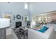 Open concept living room with high ceilings and lots of light at 591 Glenkirk Pl # 106, Garner, NC 27529