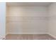 Large walk-in closet with wire shelving at 591 Glenkirk Pl # 106, Garner, NC 27529
