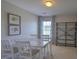 Bright dining area with table, chairs, and shelving at 2007 Frost Dr, Haw River, NC 27258