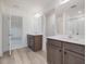 Modern bathroom with dual vanities and a spacious layout at 122 Whimbrel Ct, Lillington, NC 27546