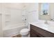 Clean bathroom with a bathtub, toilet, and vanity at 122 Whimbrel Ct, Lillington, NC 27546