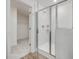 Clean bathroom with a shower and closet access at 122 Whimbrel Ct, Lillington, NC 27546