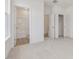Bedroom with carpet, bathroom and closet access at 122 Whimbrel Ct, Lillington, NC 27546