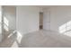 Spacious bedroom with a walk-in closet and neutral carpeting at 122 Whimbrel Ct, Lillington, NC 27546
