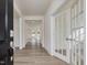 Bright entryway with hardwood floors and French doors at 122 Whimbrel Ct, Lillington, NC 27546