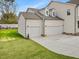 Attached two-car garage with extra storage at 122 Whimbrel Ct, Lillington, NC 27546