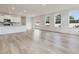 Bright kitchen features white cabinets, stainless steel appliances, and an island at 122 Whimbrel Ct, Lillington, NC 27546