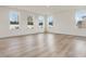 Bright and spacious living room with hardwood floors and lots of windows at 122 Whimbrel Ct, Lillington, NC 27546
