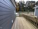 Spacious back deck with wooden railings, offering a relaxing outdoor space at 146 Weavers Grove Dr # 122, Chapel Hill, NC 27514