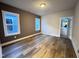 Well-lit bedroom with hardwood floors and an ensuite bathroom at 146 Weavers Grove Dr # 122, Chapel Hill, NC 27514