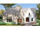 Two-story house with beige siding and brick accents at 3325 Colby Chase Dr # 9, Apex, NC 27539