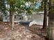 Single-wide manufactured home with wooden steps and surrounding trees at 255 Roberts Ave, Henderson, NC 27537
