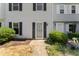 Townhouse exterior with landscaping and walkway at 15 Providence Ct, Durham, NC 27705