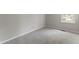 Spacious bedroom with neutral walls and carpet at 15 Providence Ct, Durham, NC 27705
