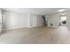 Spacious living room with wood-look floors at 15 Providence Ct, Durham, NC 27705