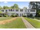 Townhouse exterior with landscaping and walkway at 15 Providence Ct, Durham, NC 27705