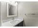 Simple bathroom with vanity and white sink at 15 Providence Ct, Durham, NC 27705