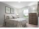 Charming bedroom with carpeted floor and window view at 188 Day Farm Dr, Lillington, NC 27546
