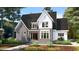 Two-story home with gray brick and white accents at 3331 Colby Chase Dr # 8, Apex, NC 27539