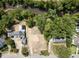 Aerial view of vacant lot near a river, with homes nearby at 401 Marlowe Rd, Raleigh, NC 27609