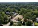 Aerial view of a house under construction in a wooded neighborhood at 401 Marlowe Rd, Raleigh, NC 27609