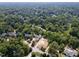 Wide aerial view of the property and surrounding neighborhood at 401 Marlowe Rd, Raleigh, NC 27609