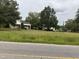 Aerial view of property with two houses and a large yard at 4516 Us 301, Four Oaks, NC 27524