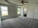 Bright bedroom with carpet flooring and en-suite bathroom at 152 Lotus Ave, Smithfield, NC 27577