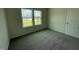 Simple bedroom with carpet and neutral walls at 152 Lotus Ave, Smithfield, NC 27577