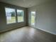 Versatile bonus room with hardwood floors and access to the backyard at 116 Lotus Ave, Smithfield, NC 27577