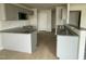 Modern kitchen with granite countertops and gray cabinets at 116 Lotus Ave, Smithfield, NC 27577
