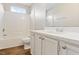 Bathroom with white vanity, tub and toilet at 3008 Twinfield Ct, Raleigh, NC 27610