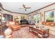 Bright living room with hardwood floors and access to deck at 808 N Lincoln St, Benson, NC 27504