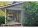 Screened porch and side view of gray house at 260 S Rocky River Rd, Moncure, NC 27559