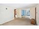 Spacious living room with access to other rooms at 260 S Rocky River Rd, Moncure, NC 27559