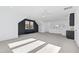 Bonus room with wet bar, black accent wall, and recessed lighting at 1610 Carson St, Raleigh, NC 27608